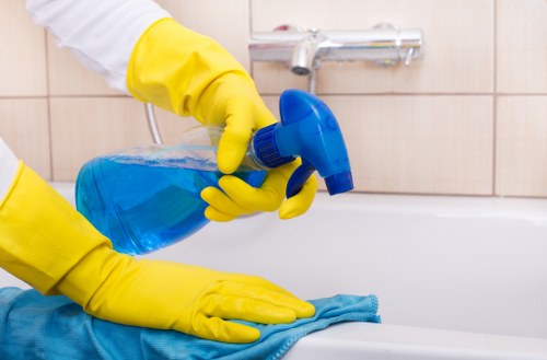 Professional carpet cleaners applying a careful risk assessment process